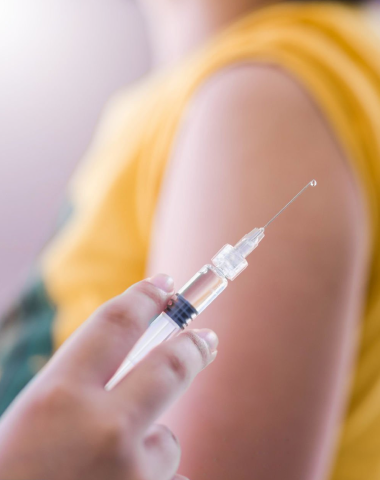 needle with flu vaccine in it
