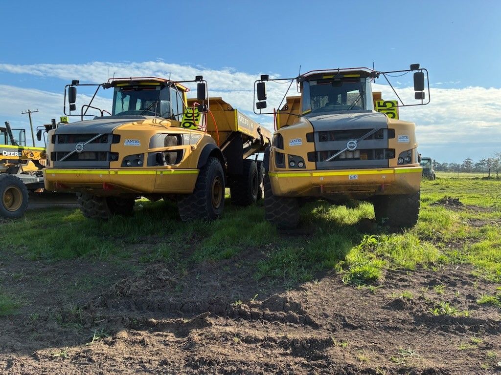 A Dump Trucks on a grass spot — Lantry Earthmoving in Phoenix Park, NSW