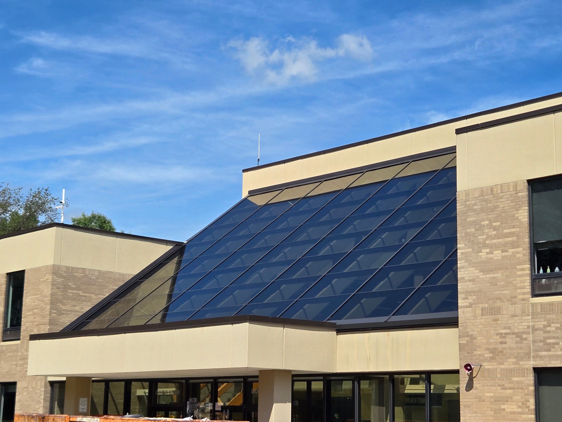 Modern building exterior with glass facade and skylight in Chicago
