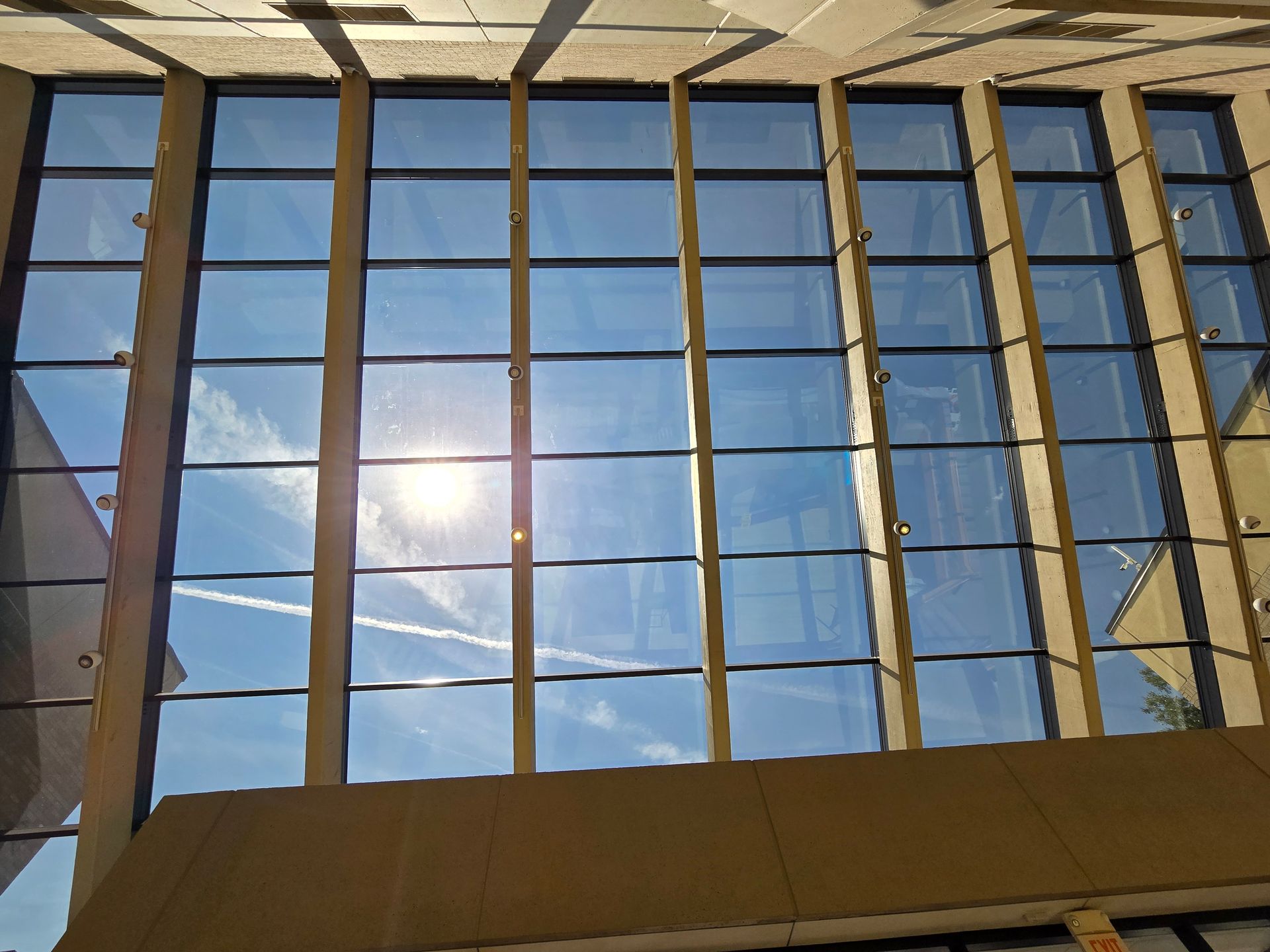 Bright Chicago street under a clear sky with skylight reflections