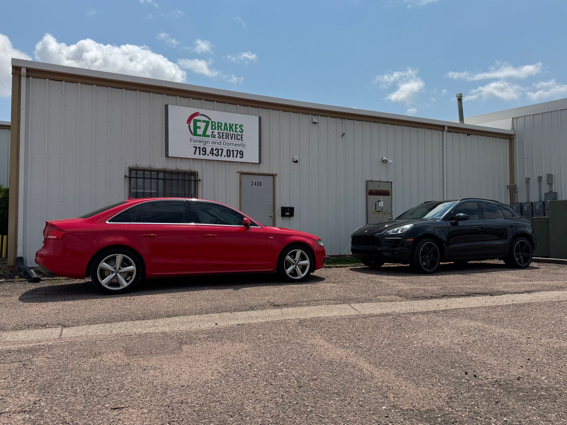 White Lexus Sedan with Black Accents in Front of EZ Brakes & Service Building | EZ Brakes & Service