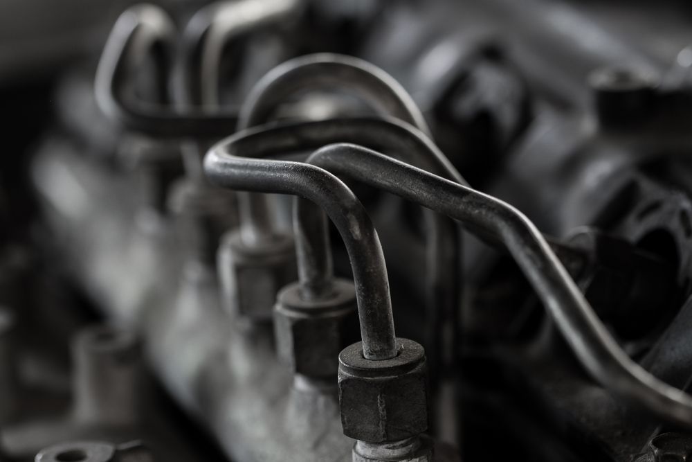 A Close Up of a Diesel Engine With Fuel Lines Coming Out of It — Mick Dunn Motor Repairs in Mackay, QLD