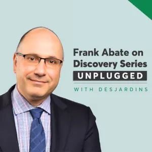 Frank Abate, wearing glasses and a suit, for the