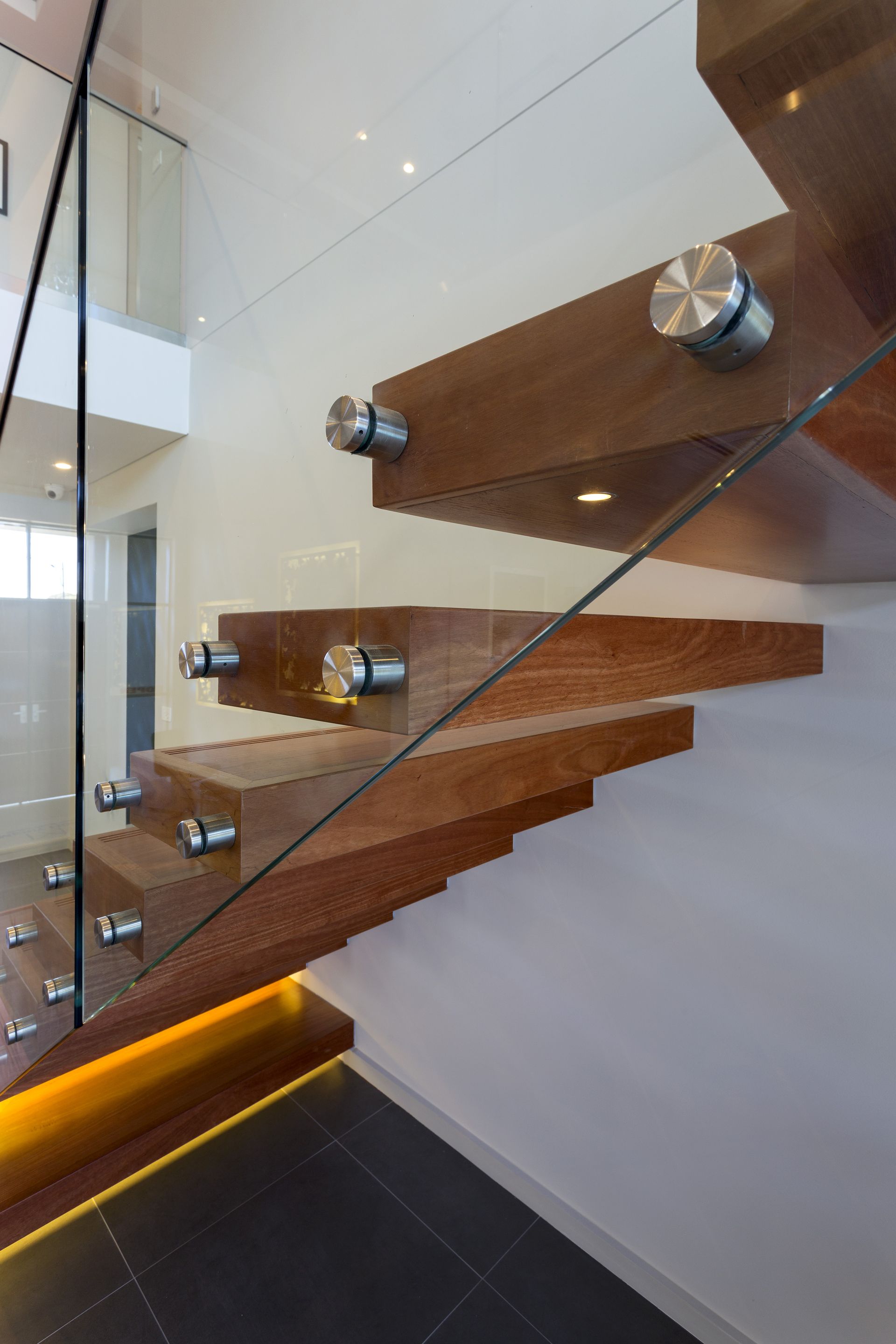 Floating Wooden Staircase with Glass Railings — Coastline Glass Pool Fencing in Old Bar, NSW