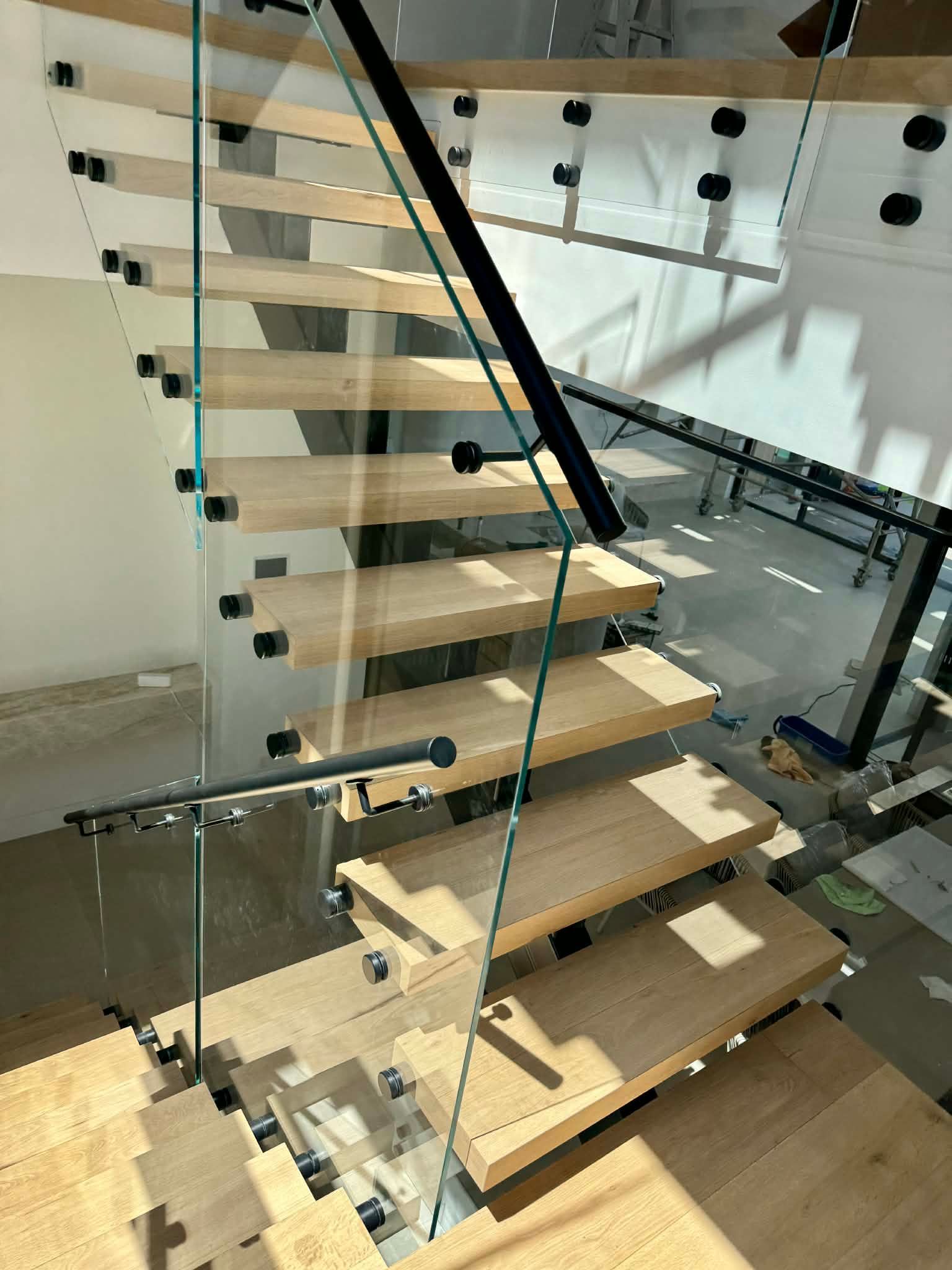 Modern Staircase with Light Wood Treads — Coastline Glass Pool Fencing in Old Bar, NSW