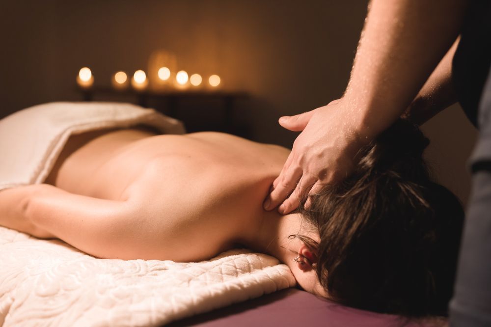 A Woman is Getting a Massage at a Spa — Siam Thai Massage In Tweed Heads, NSW