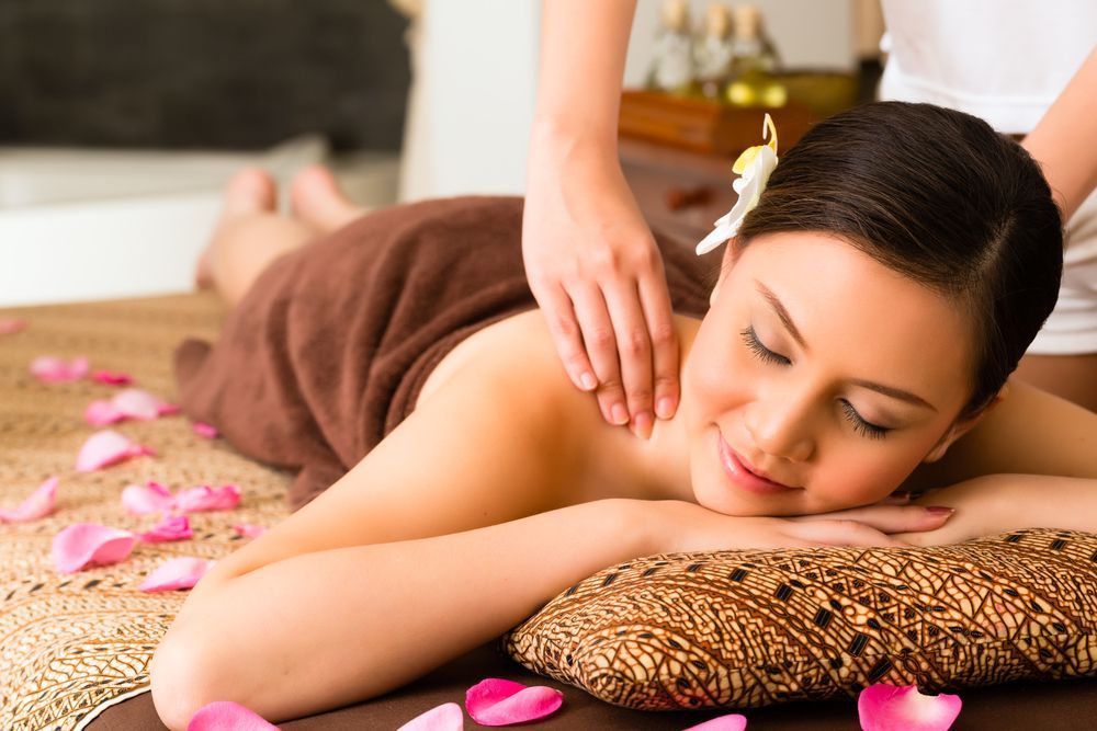 A Woman is Getting a Massage at a Spa — Siam Thai Massage In Tweed Heads, NSW
