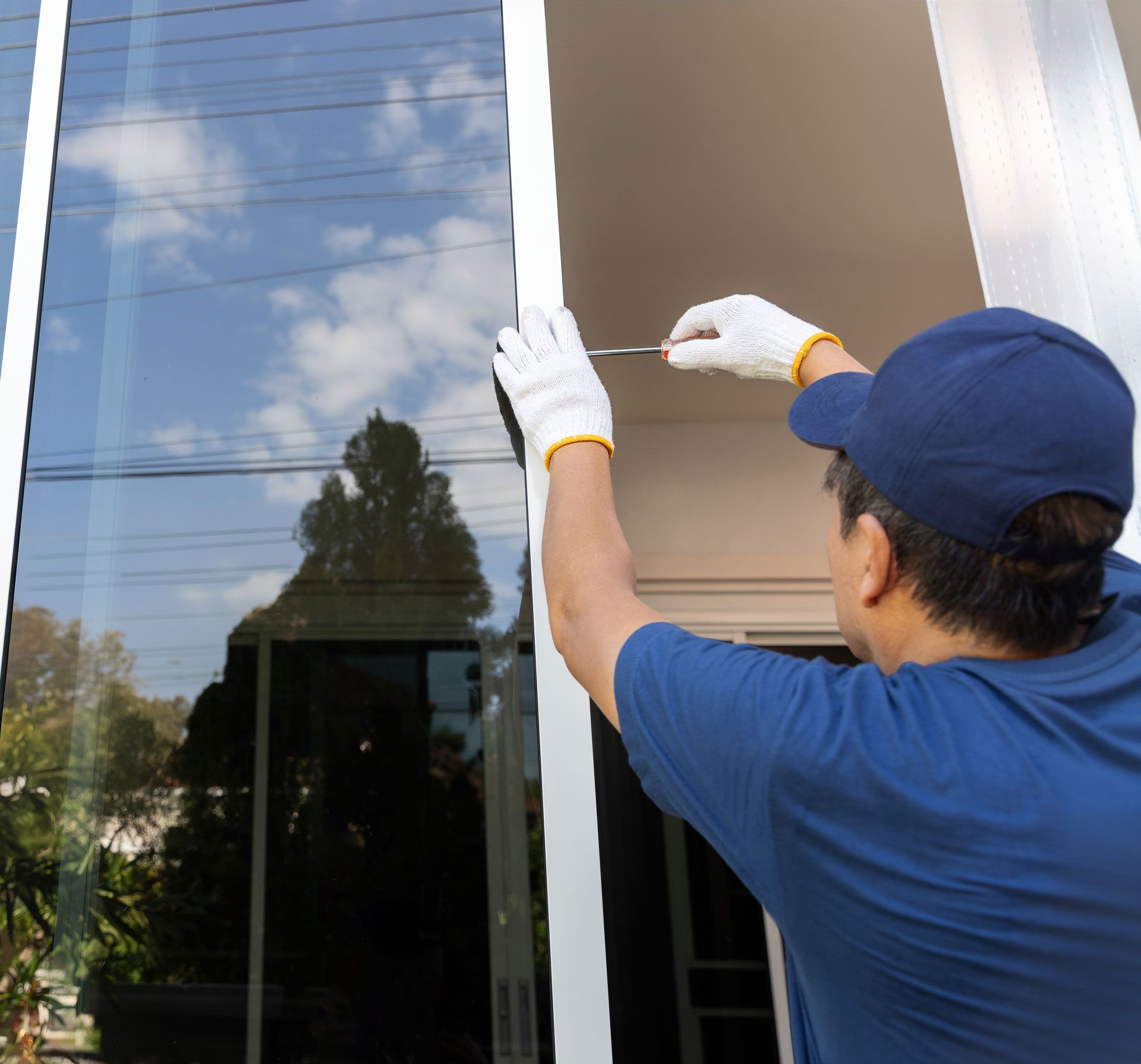Worker doing window installation
