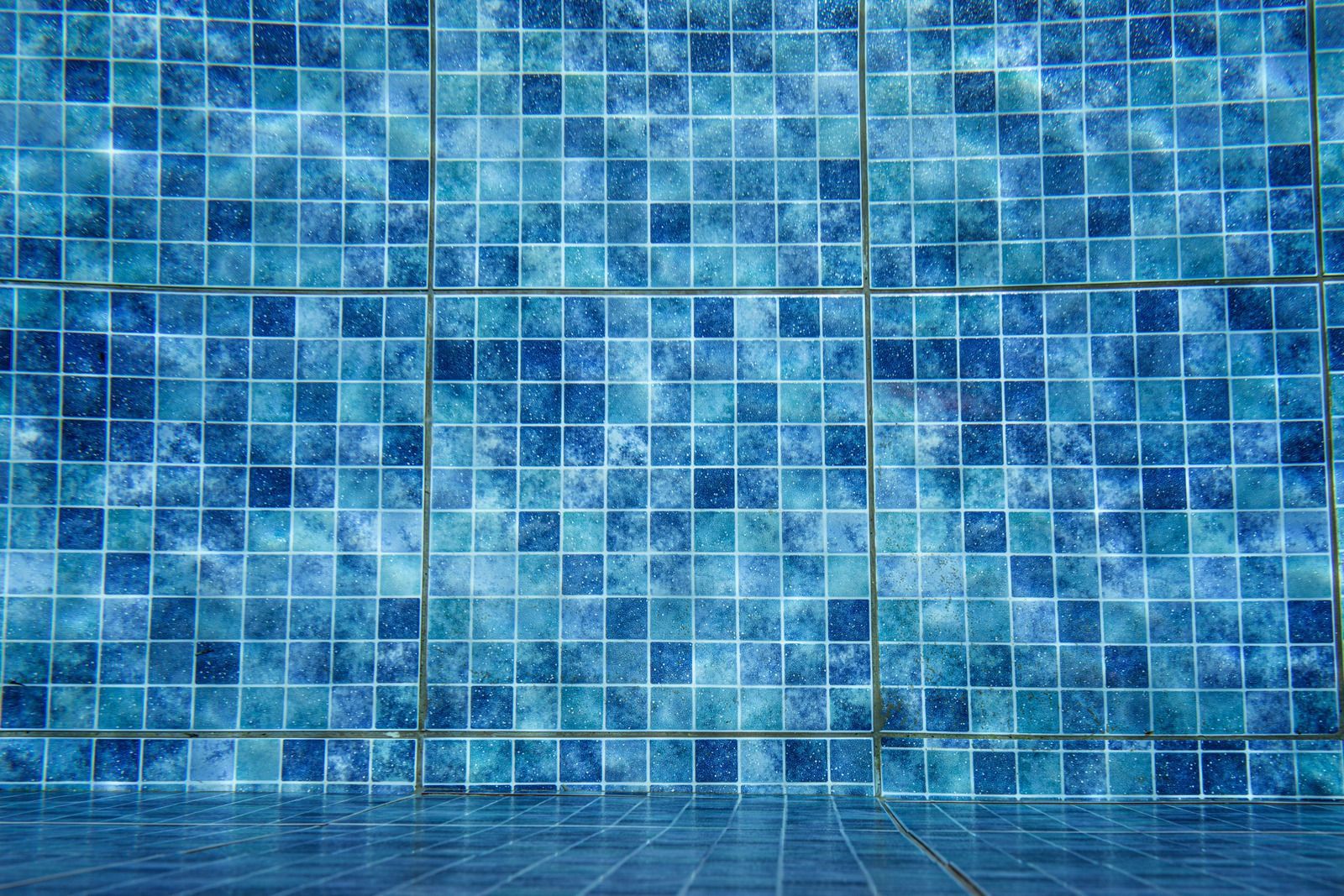 Blue mosaic tile background.