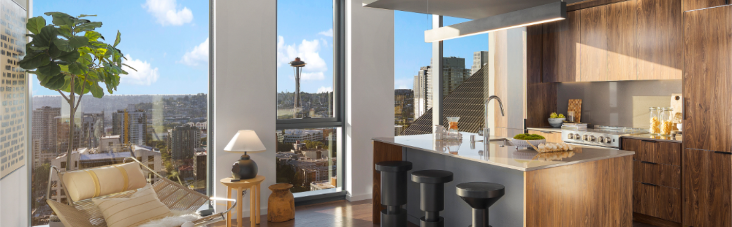 Bright modern apartment with floor-to-ceiling windows, city view, and open kitchen-living area with wooden island.