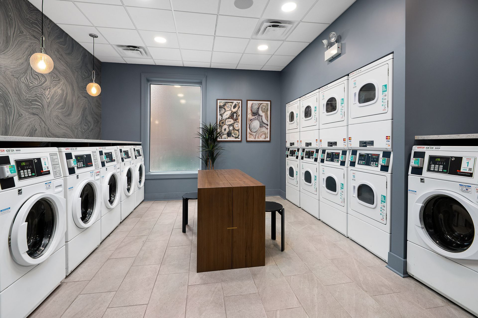 Laundry room at Reside on Surf in Chicago, IL