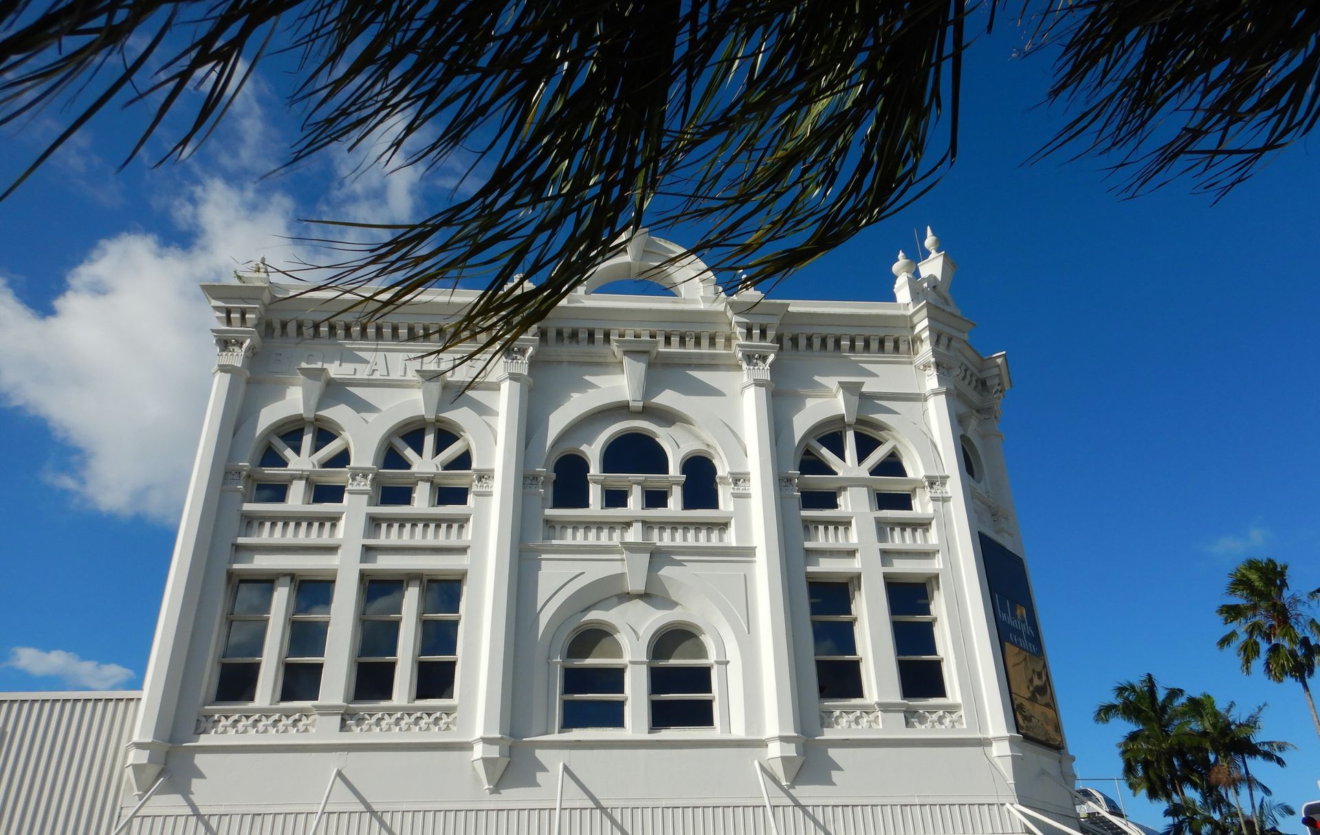 Historic architecture above shopfronts on Lake Street in Cairns CBD, showing the city’s heritage buildings.