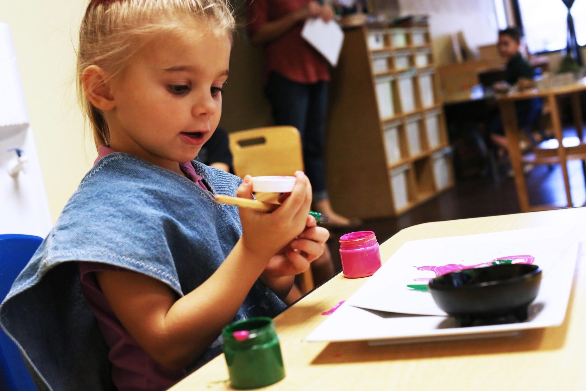 Montessori child painting