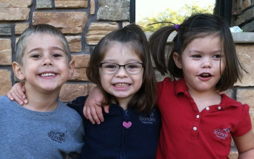 A group of Montessori child smiling