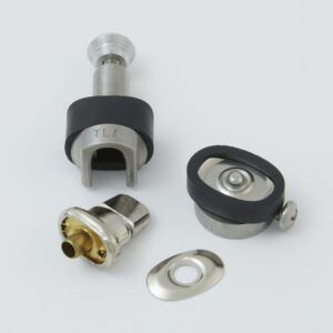 Black tool with a serrated end and a small metal clip next to it.