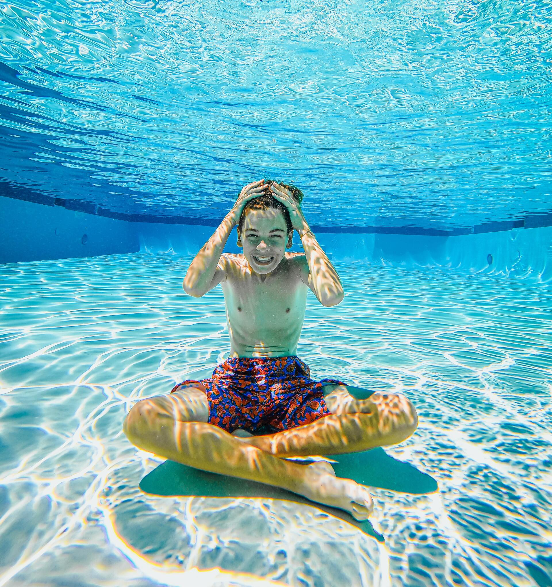 boy-underwater-in-clean-pool