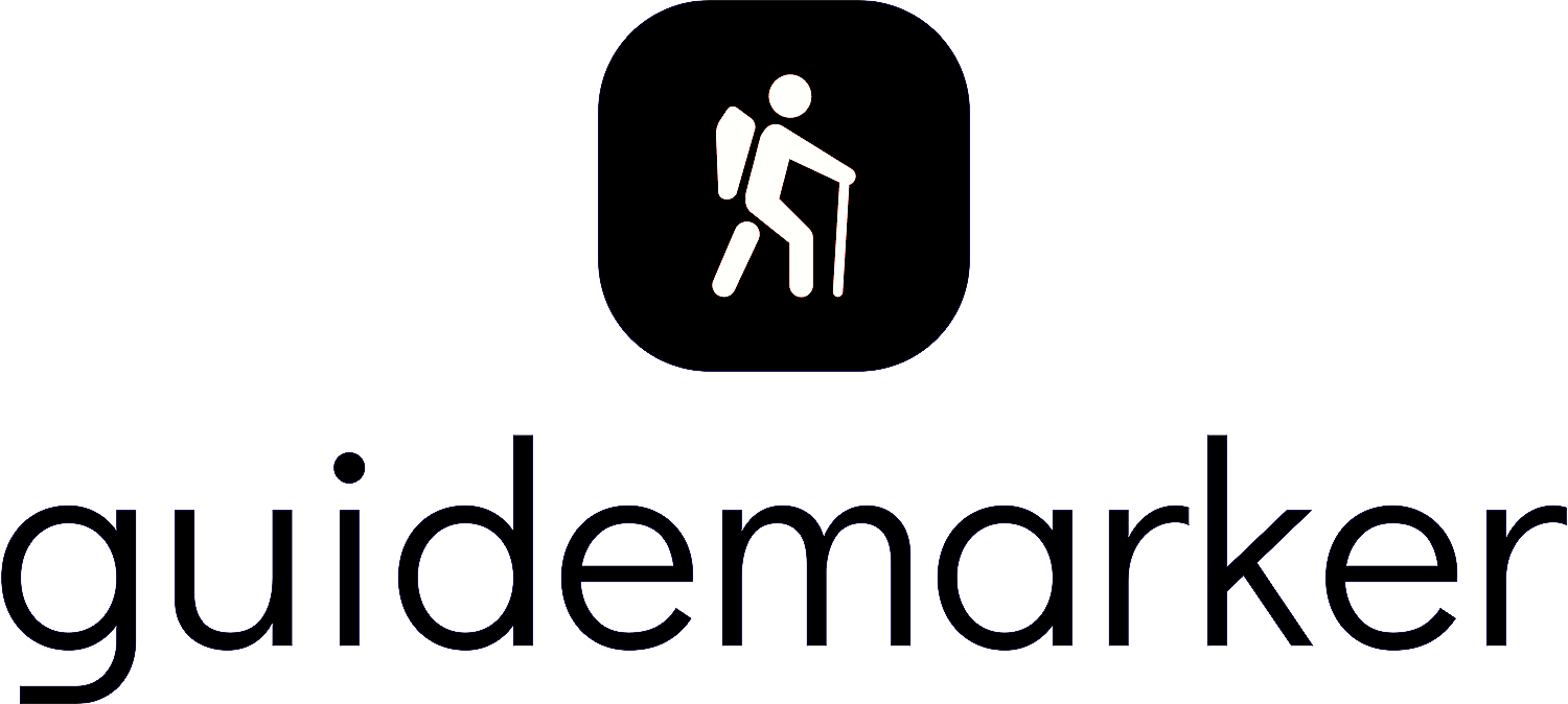 a blue logo for a company called guidemarker