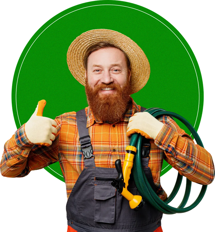 A man with a beard is holding a garden hose and giving a thumbs up