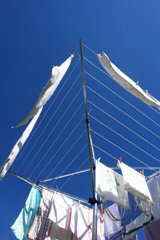 Clothes Hanging on a Clothes Line With a Blue Sky in the Background — South Coast Clothes Lines in Shellharbour, NSW