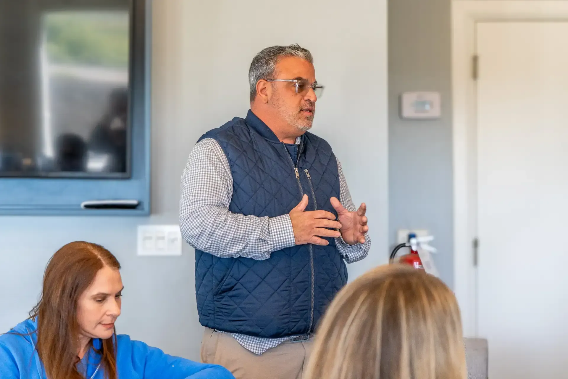 Beachside Mavericks member leading a business discussion during a networking event