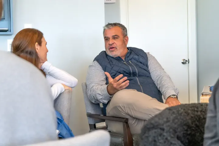 Beachside Mavericks members building professional connections during a networking event