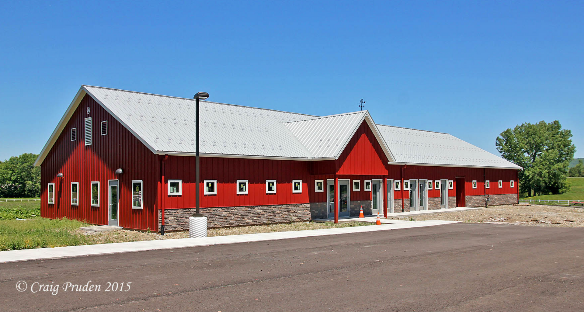 A large red barn with a white roof