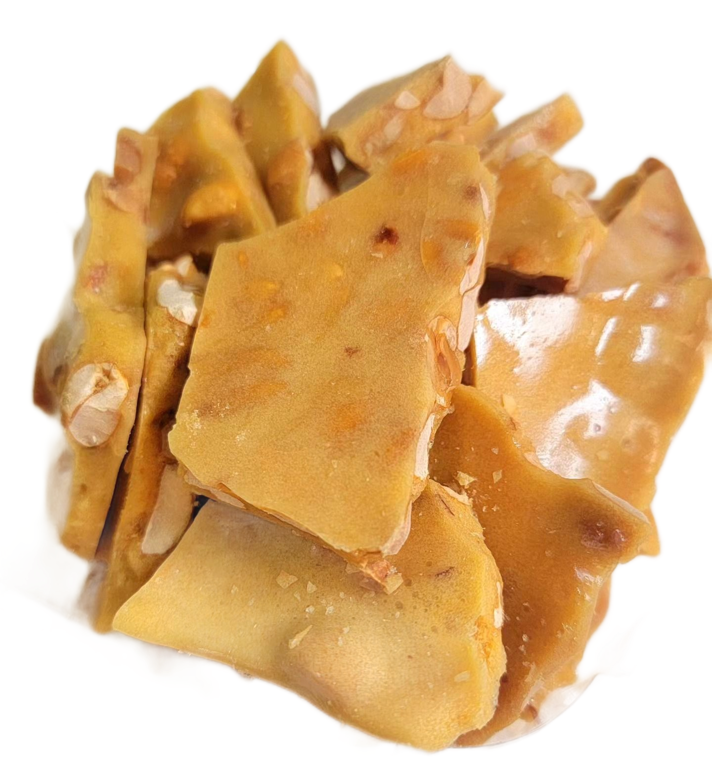 Golden peanut brittle, cracked into irregular pieces.