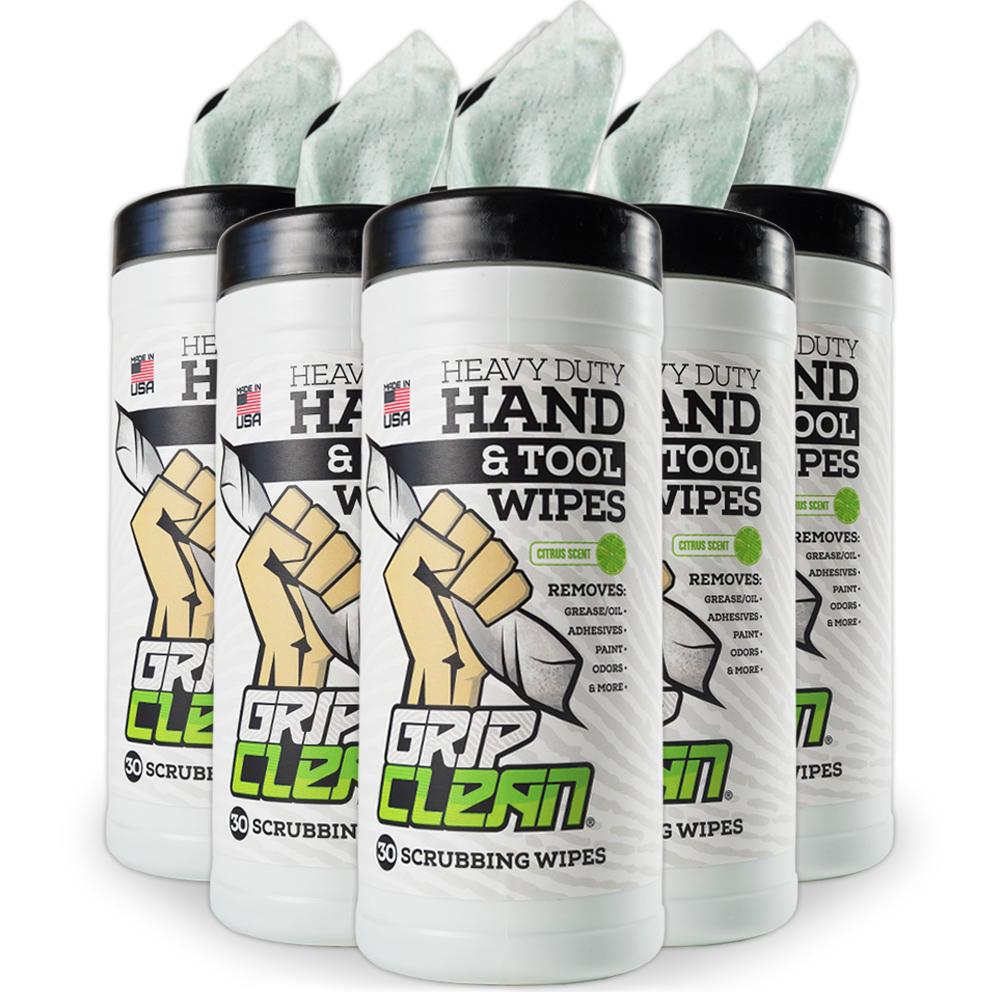 six bottles of grip clean hand and tool wipes