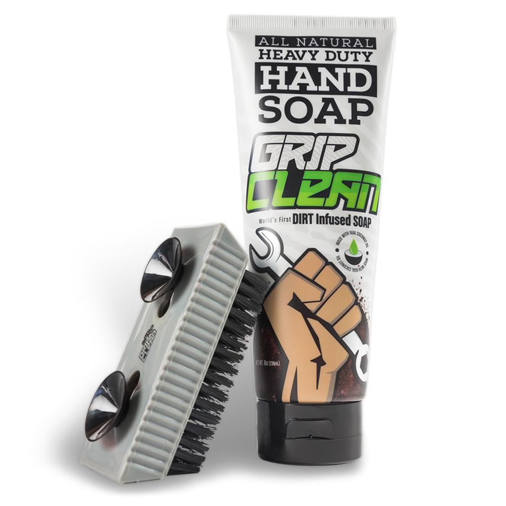 a tube of hand soap next to a brush