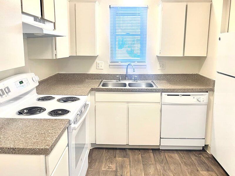Kitchen with White Appliances | Lakeside Villas Apartments in Thornton, CO