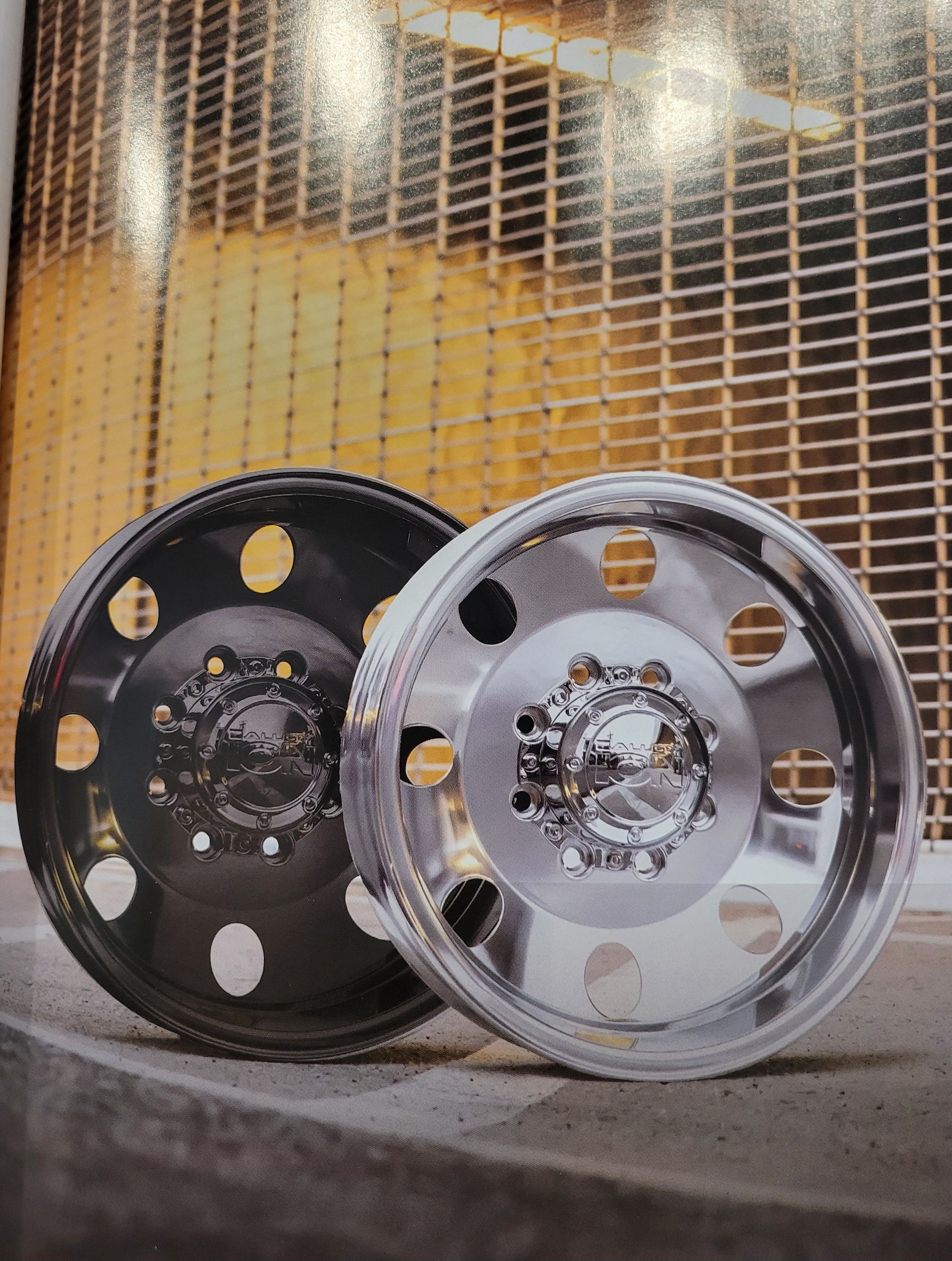 Black and silver car wheel with red accents. Black and silver car wheel with red accents.