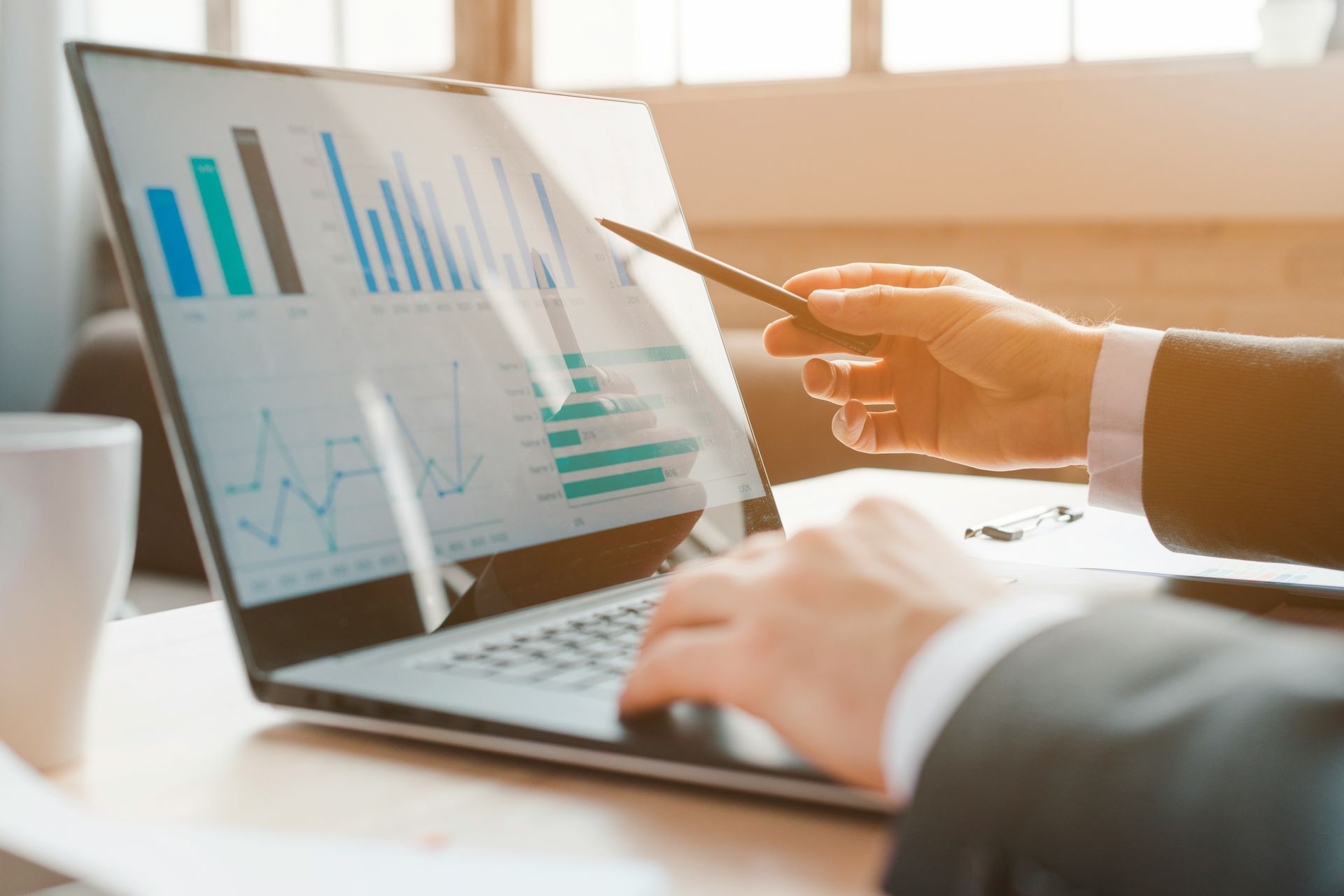 Printed charts showing quantitative market research methods on a business report page.