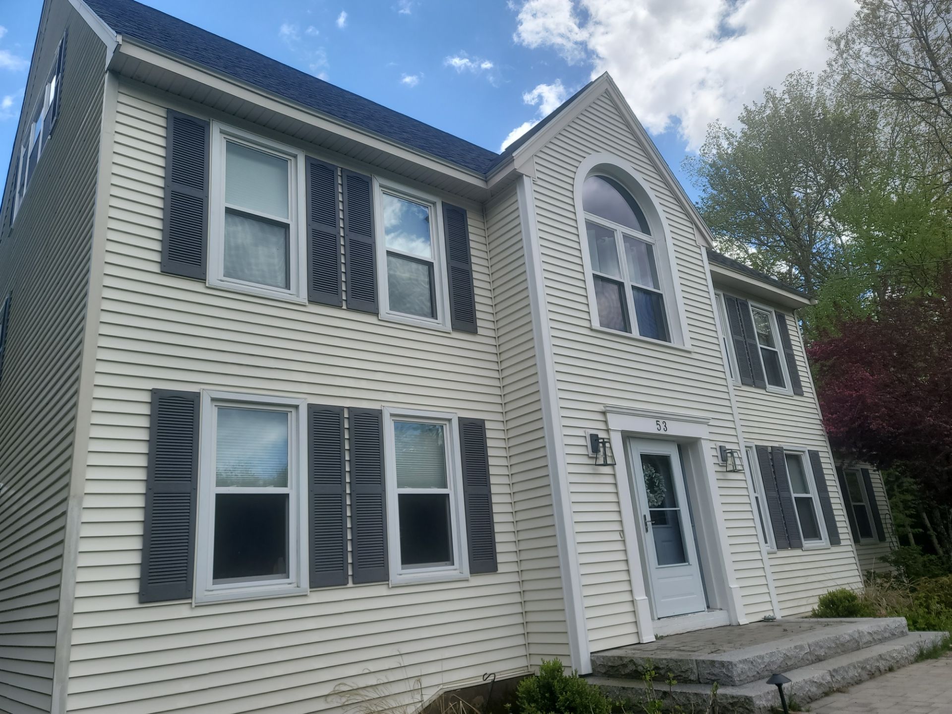 Exterior house painting in Manchester, NH.