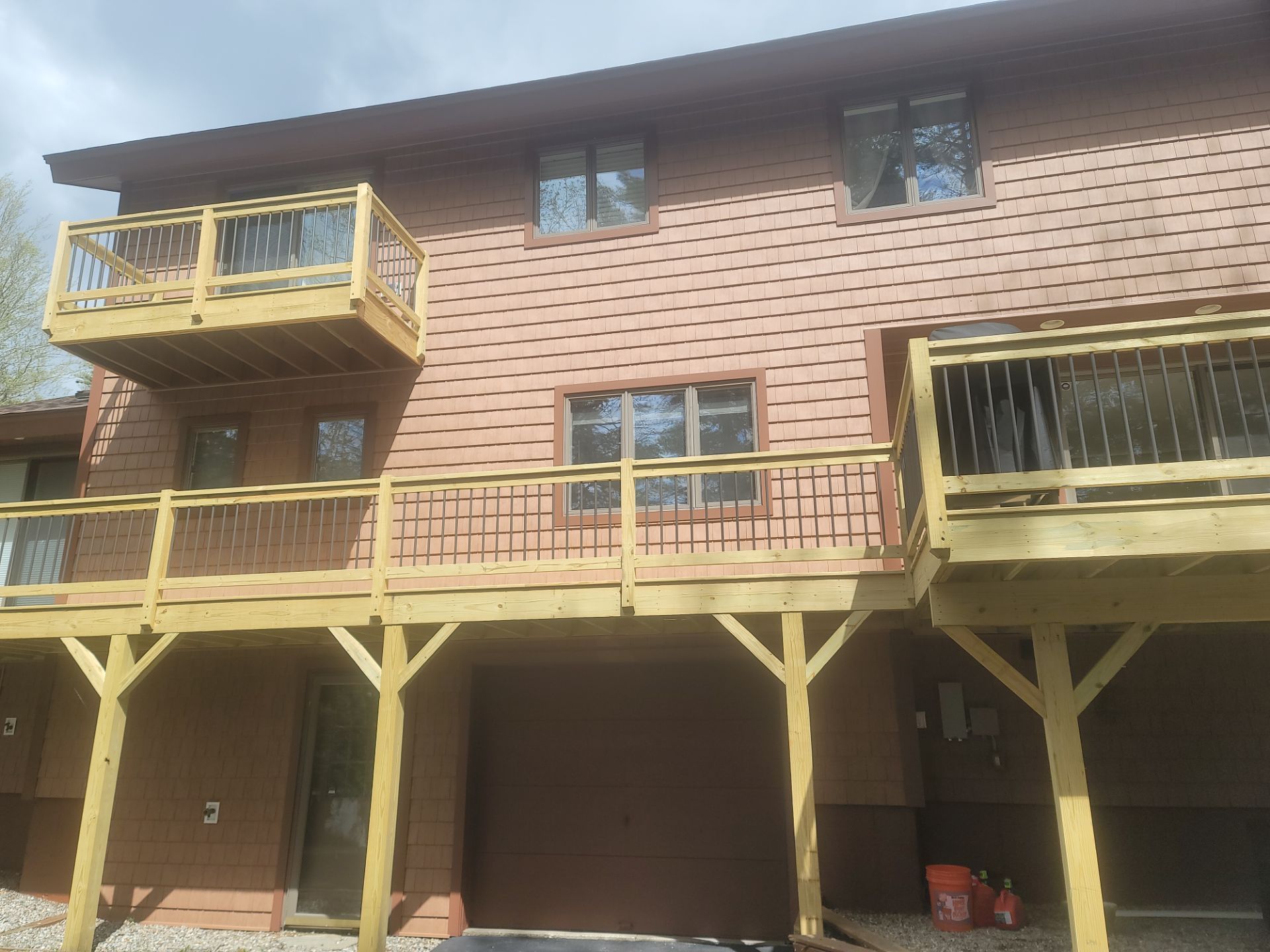 Power washing a deck in Manchester, NH.