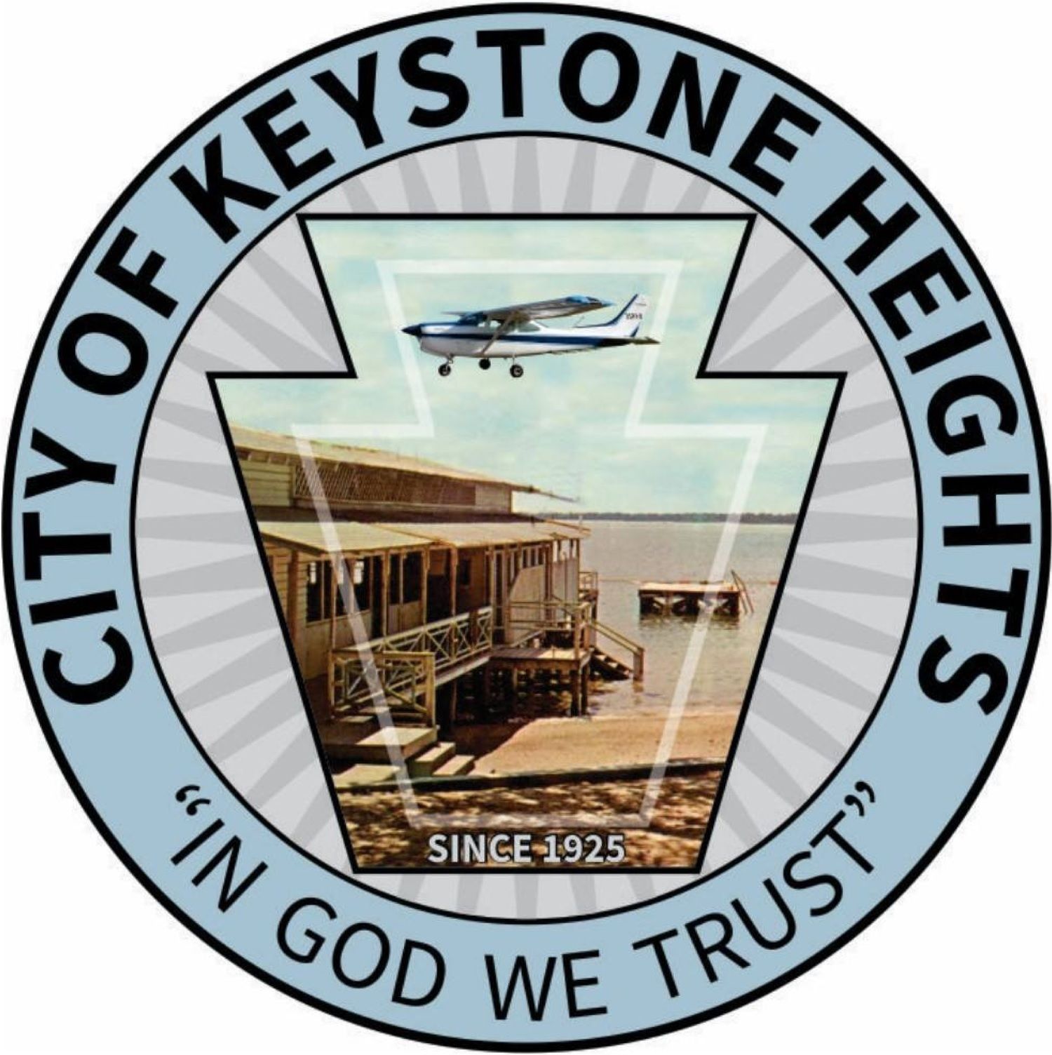 City of Keystone Heights seal: airplane, lake house, 