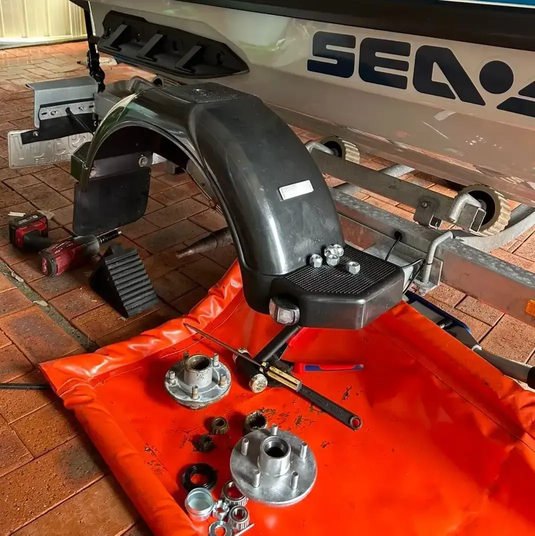 Jet Ski Fender and Components Laid Out on an Orange Mat During Maintenance — All Auto & Mechanical in The Entrance North, NSW