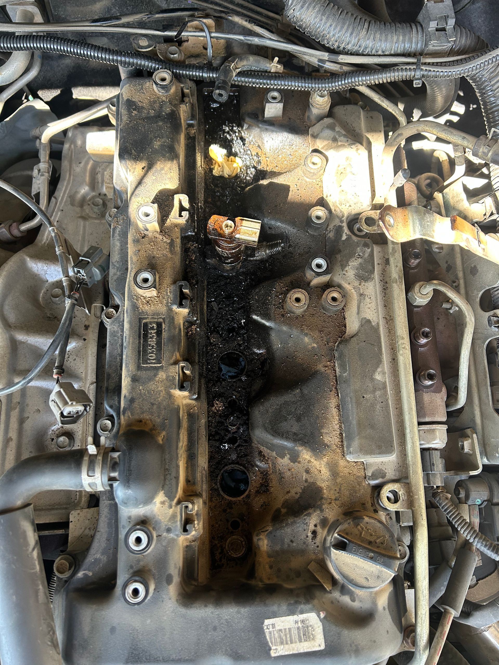 Engine component covered in oil and grime. — All Auto & Mechanical in Erina, NSW