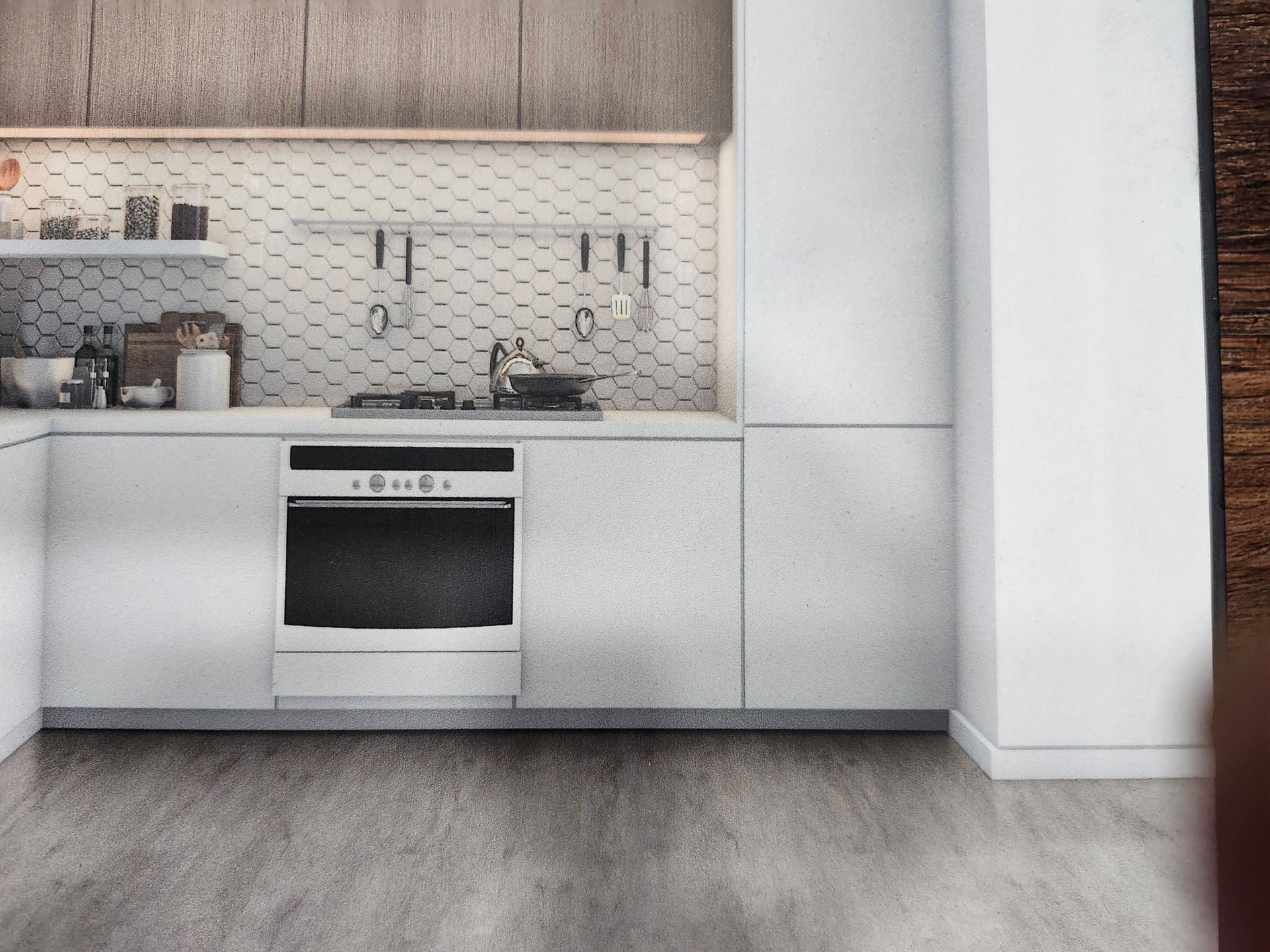 A piece of wood is sitting on top of a concrete floor.