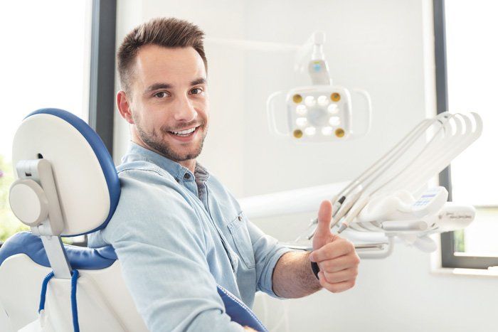 Smiling Man At Dental Clinic — Bloomingdale, IL — Dr Boyer & Scheive, DDS