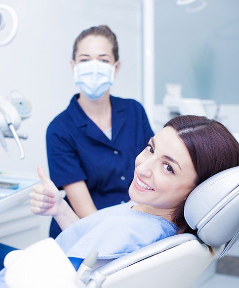 Woman Taking Dental Treatment — Bloomingdale, IL — Dr Boyer & Scheive, DDS
