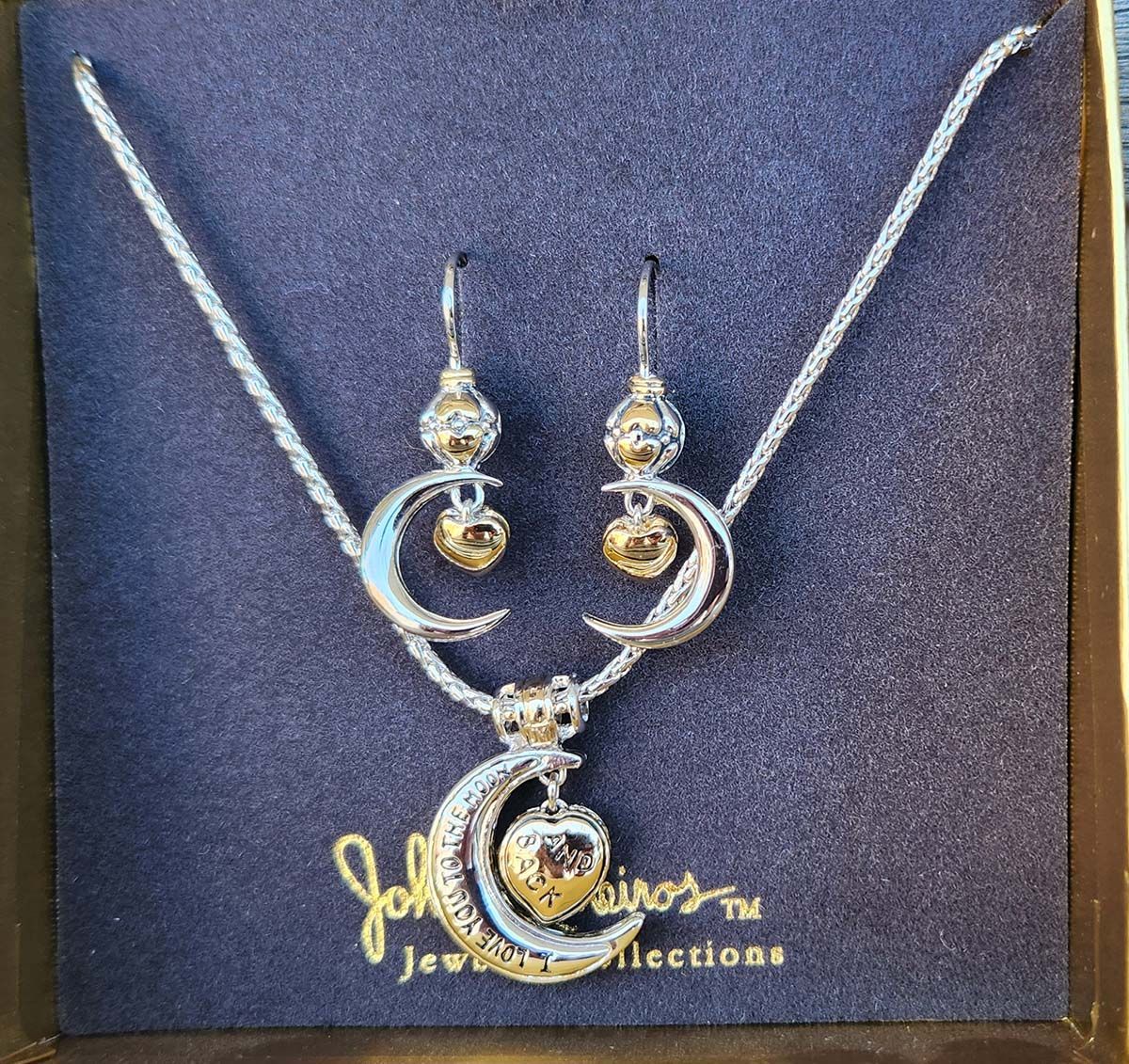 A necklace and earring set from johnson jewel collections