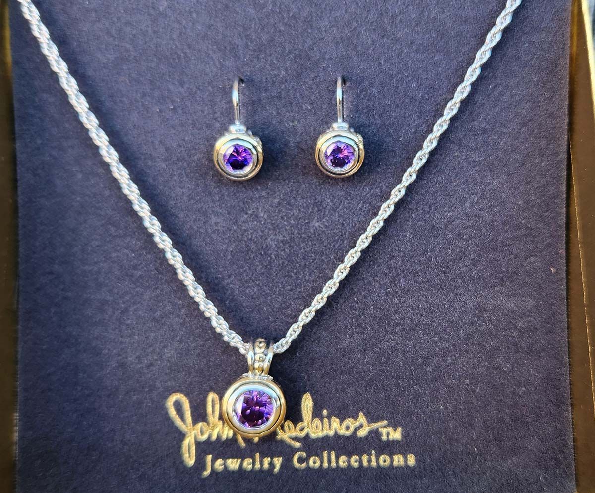A necklace and earring set from john pedrinos jewelry collections