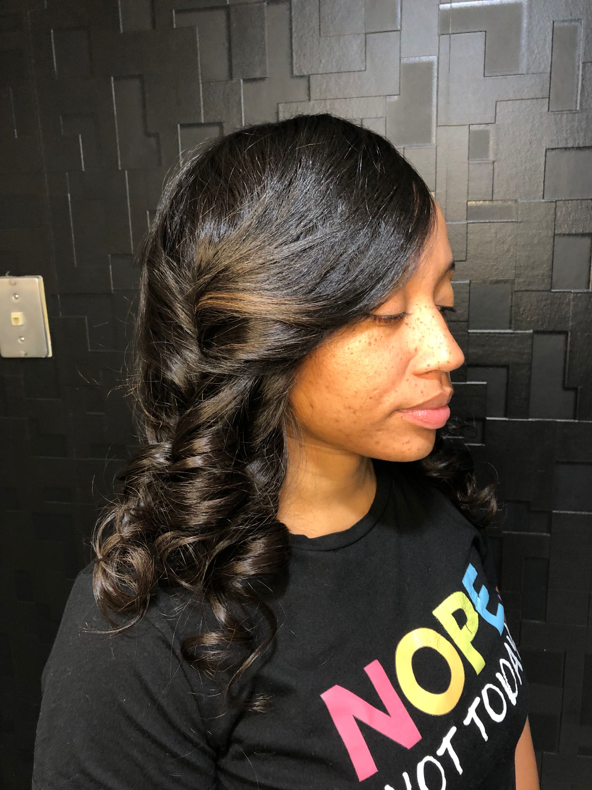 Curls that move and shine! On natural hair a silk press with lots of body. 