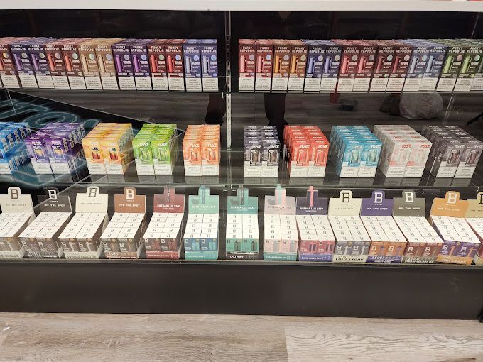 A display case filled with lots of different types of cigarettes.