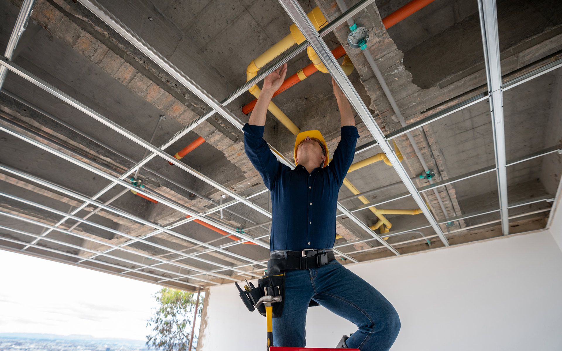 Man Fixing Pipes — Eugene, OR — Tom’s Plumbing Service