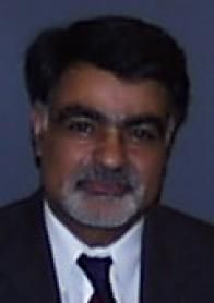 Silhouette of a person, likely male, in a suit jacket, head and shoulders.