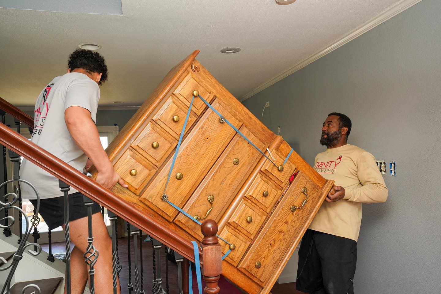 2 Man Moving Cabinet Upstairs — New Braunfels, TX — Trinity Movers