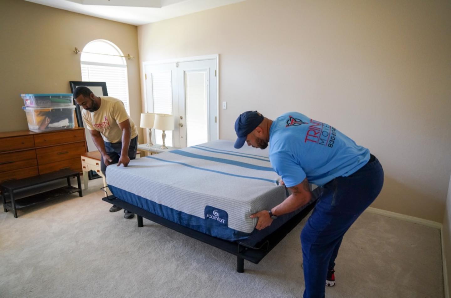 2 Man Fixing Bed Sheet — New Braunfels, TX — Trinity Movers