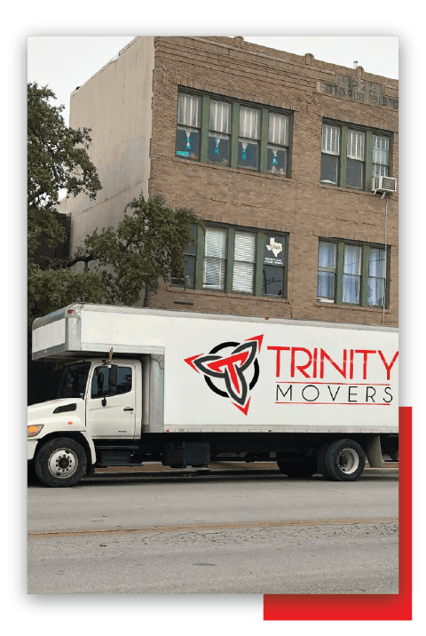 Truck Parked Front Of Building — New Braunfels, TX — Trinity Movers