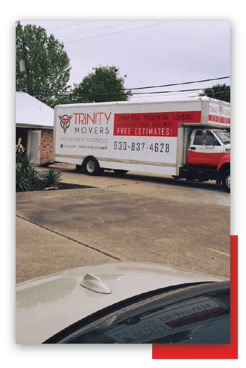 Side View Of Truck With Trinity Logo — New Braunfels, TX — Trinity Movers